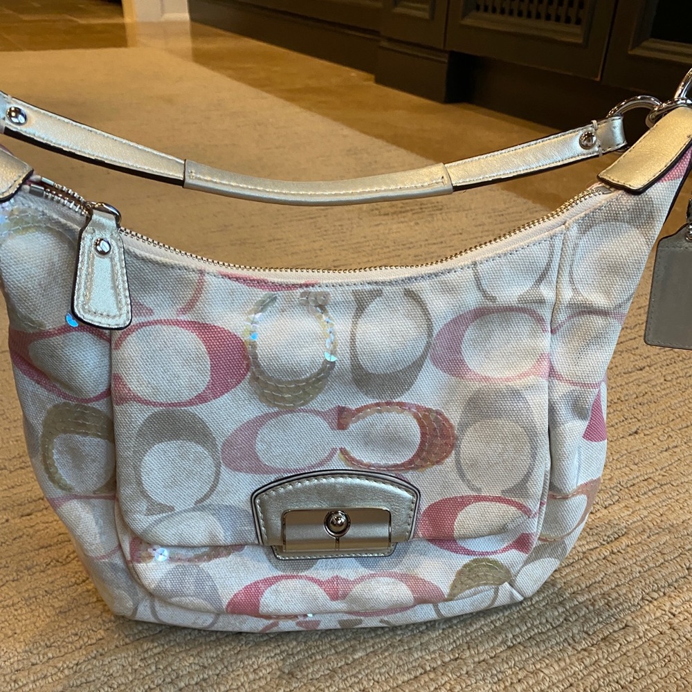 Signature coach shoulder purse